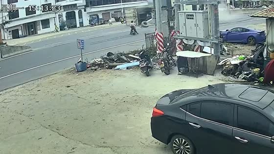 Truck veers off road after avoiding motorcyclist in China accident