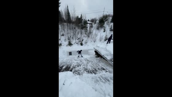Friend slips and falls from snowy roof in Temiscaming, Quebec, Canada