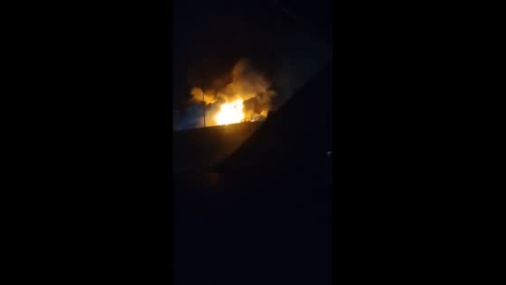 Massive warehouse fire visible from I-55 North in St. Louis, USA