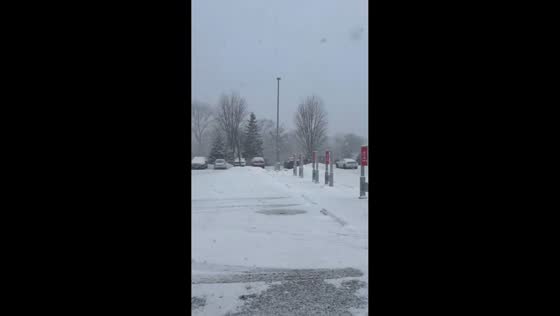 Huge lake-effect snowflakes fall in DuPage County during winter burst in Illinois, USA
