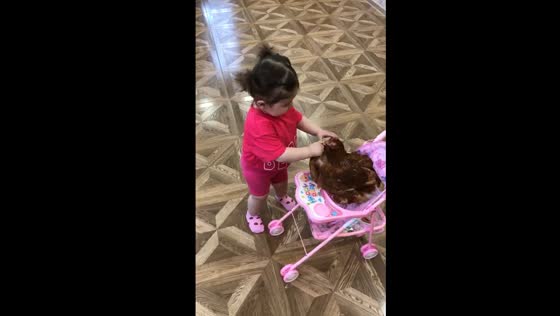 Child's delight: playful interaction with chicken