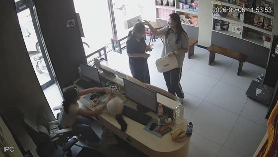 Bird lands on a woman’s head during a visit to a pet hospital in Tianjin, China