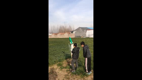 Boys launch plastic bottle rocket in Shandong, China
