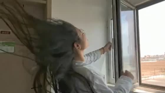 Wind gusts blow in after window is opened in Hebei, China