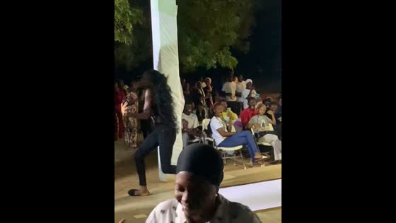 Model slips but regains balance on runway in Tamale, Ghana