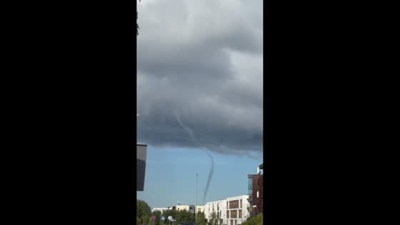 Dramatic funnel cloud descends near Tiskre coast in Tallinn, Estonia