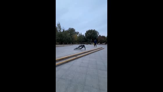 Man slips attempting bicycle jump in Jilin, China