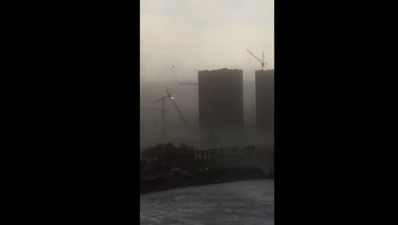 Tower crane plunges amid severe thunderstorm in St. Petersburg