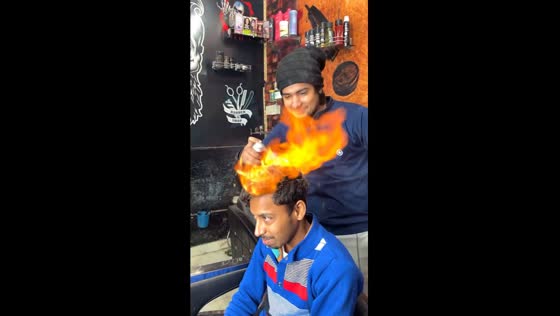 New Delhi barber takes haircut to the next level with daring fire haircut technique