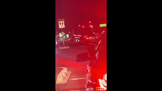 Driver drops phone while trying to ask for a number in Tempe, Arizona, USA