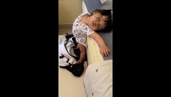 Toddler caught sleeping while standing in Surabaya, Indonesia