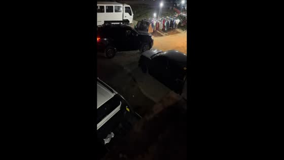 Car knocks over hanging clothes like dominoes in Manila, Philippines