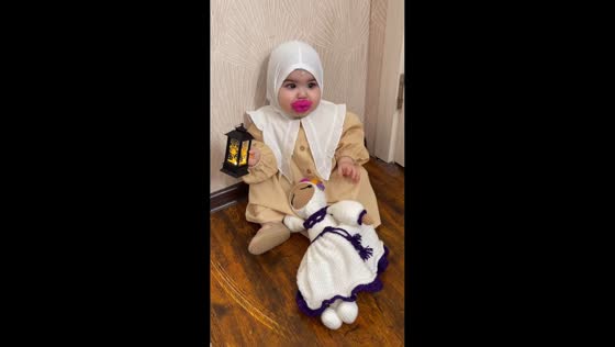 Baby gets pacifier with lips design in Saint Petersburg, Russia