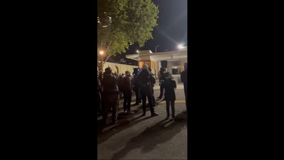 Protesters clash with police outside ICE facility during troop deployment in Portland, Oregon, USA