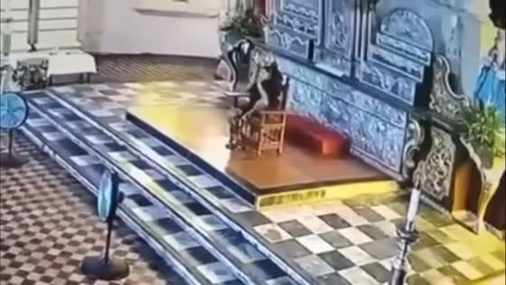 Man rides motorcycle into Taal Basilica and sits on priest’s chair in Batangas, Philippines