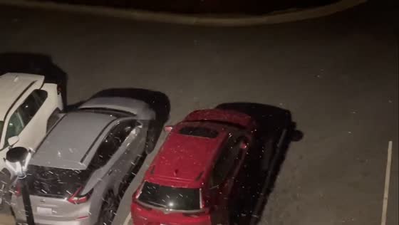 Light snow drifts across Charlotte, North Carolina, USA
