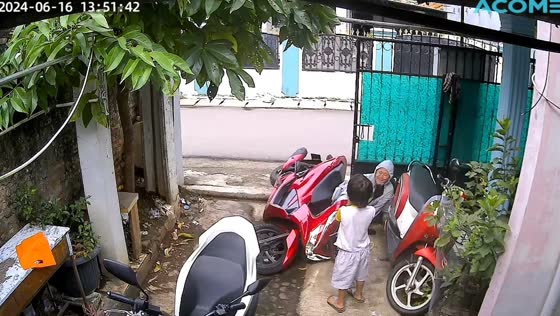 Motorcycle fall at home entrance in Bekasi, Indonesia