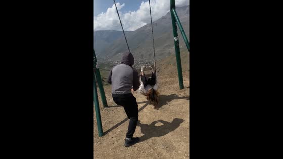 Sister falls off swing in Vladikavkaz, Russia