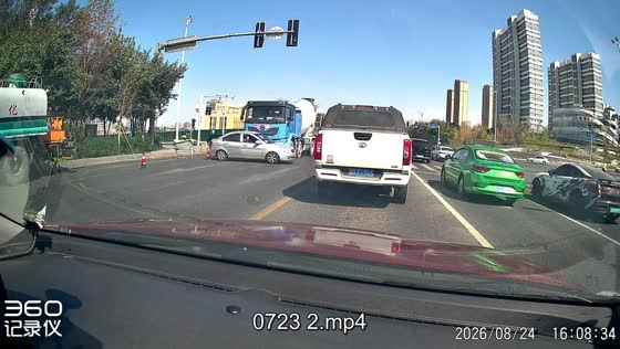 Cement truck pushes sedan during road collision in Xinjiang, China