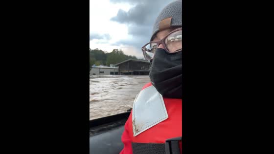 Person rescued from roof during floods in Asheville, North Carolina
