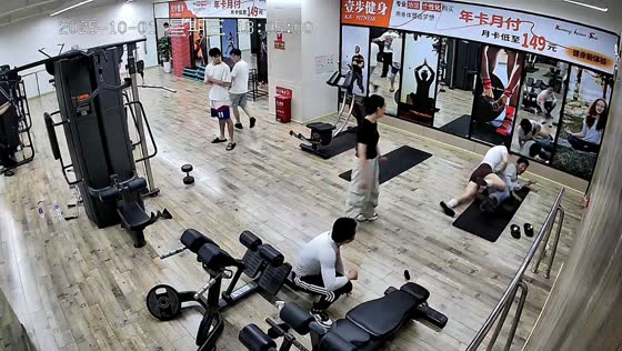 Woman accidentally tumbles onto man during workout in Yunnan, China