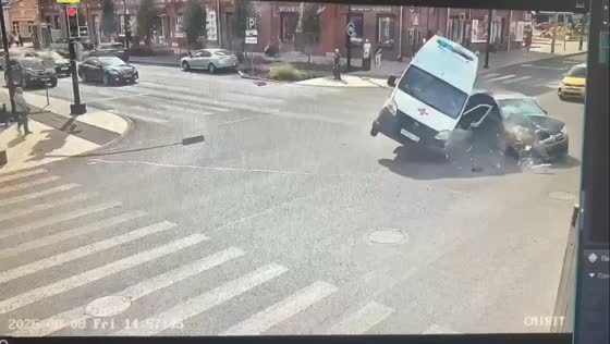 Ambulance overturns in collision with car in Cherepovets, Russia