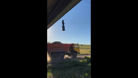 Man jumps through hanging drum and lands on truck in Rostov-on-Don, Russia
