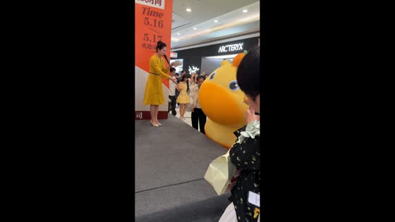 Mascot struggles and hops onto stage in Zhejiang, China