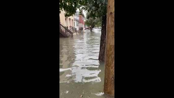 Floodwaters submerge homes and streets on Juniper Avenue in Wildwood, USA