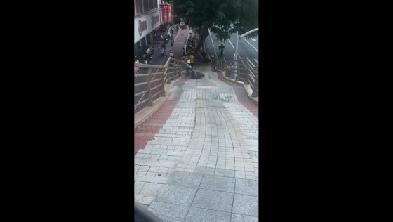 Man tumbles down stairs with motorcycle in Fujian Province, China