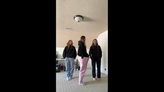 Friends jump in jacket sleeve trend in South Jordan, Utah