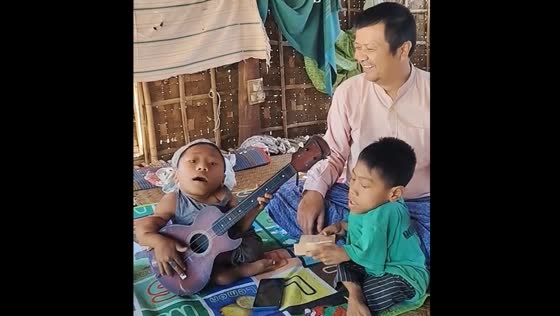 Disabled twins sing and play guitar in Magway Region
