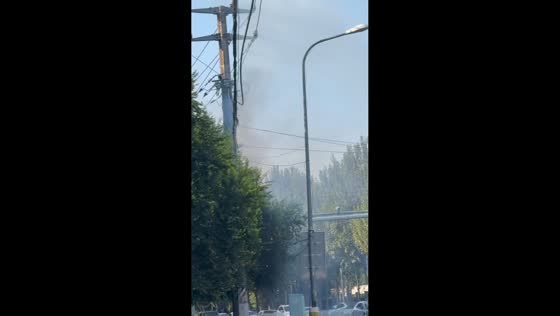 Electrical arc sends sparks from utility pole in Liaoning, China