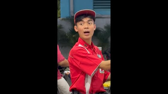 Gas station attendant startled by insect on collar in South Jakarta