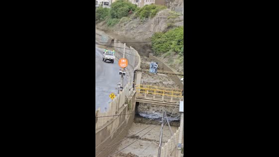 Flooded river canal in La Paz, Bolivia: video captures rising waters and road overflow