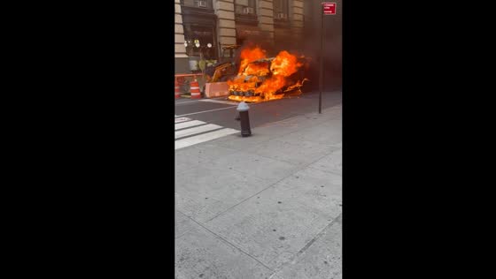 Van fire engulfs Midtown Manhattan in thick black smoke