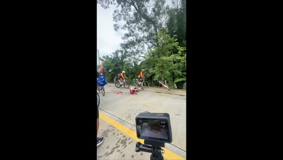 Cyclist crashes during Tour of Guangxi but quickly recovers in Guangxi, China