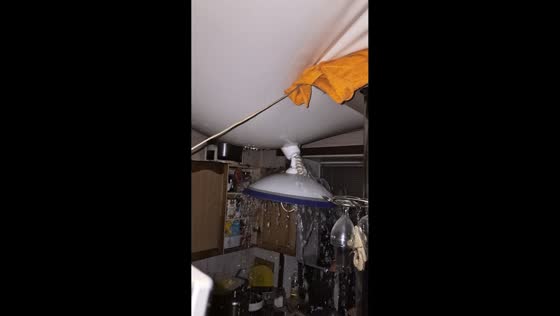 Ceiling leak floods kitchen at apartment in Kemerovo, Russia