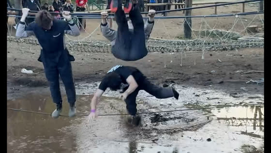 Boys play survival game, tackle attempt fails into mud