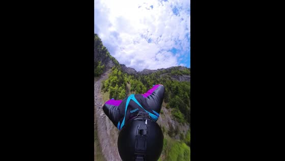 Wingsuit flight down a Swiss mountain