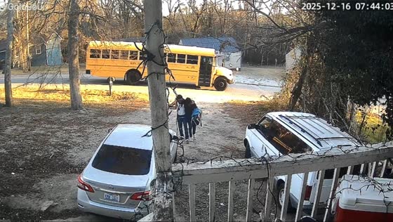 Student trips while boarding school bus in Louisburg, North Carolina, USA