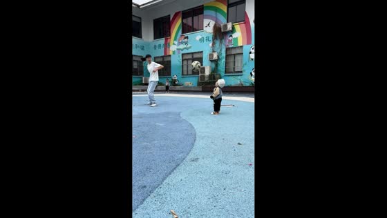 Bouncing football accidentally hits child during outdoor play in Jiangsu, China