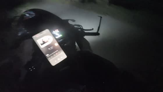 Motorcycle collision on dark rural road due to phone distraction in Jiangsu, China