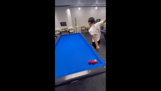 Flying cue ball hits bystander during billiard game in Hong Kong