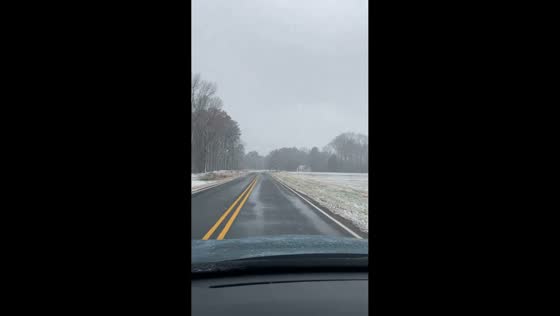 Unexpected snow blankets landscape after storm in Henderson, USA