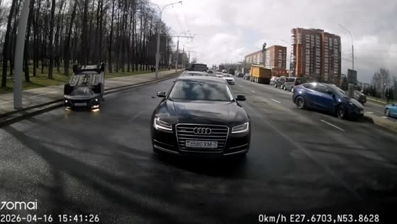Two cars collide and overturn during three-vehicle crash on Partizansky Avenue in Minsk, Belarus
