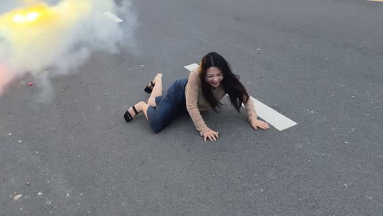 Woman trips while running from firecrackers in Henan, China