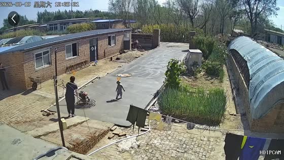Baby runs onto wet cement in Liaoning, China