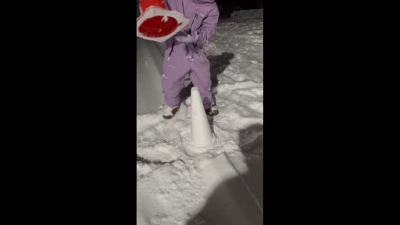 Man creates snow safety cones in Yuzawa, Japan
