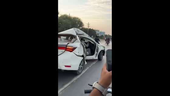 Heavily damaged car still in operation in Jhelum, Pakistan